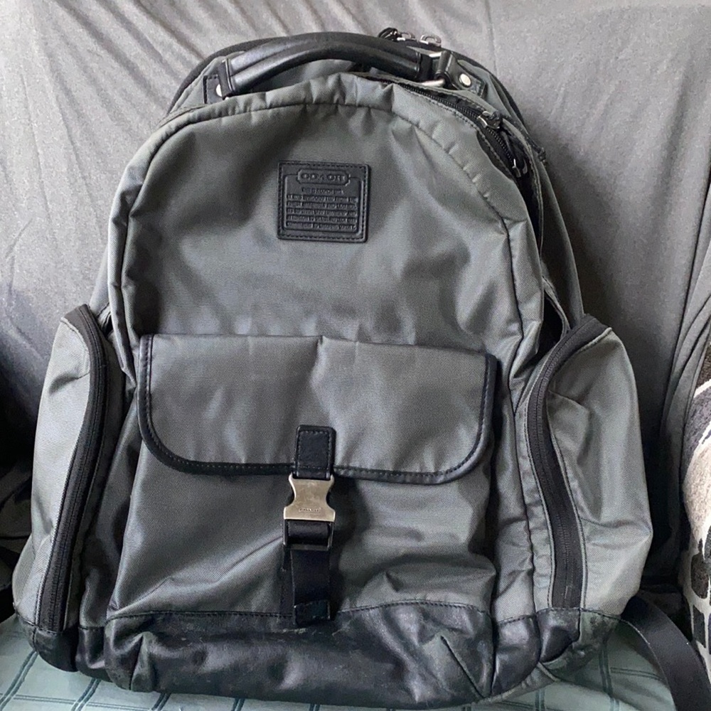Coach men’s backpack. Black and pewter. Padded for laptop.